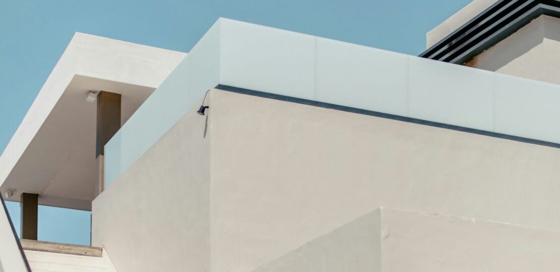 white-concrete-building-under-blue-sky-during-daytime-scaled-e1715910674405